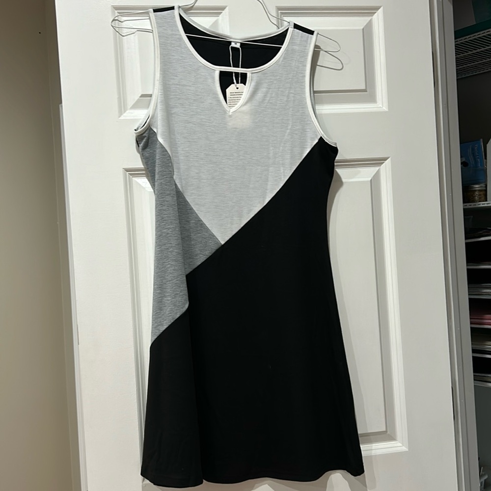 Never worn, A line dress with detail at the neck.  Perfect for summer